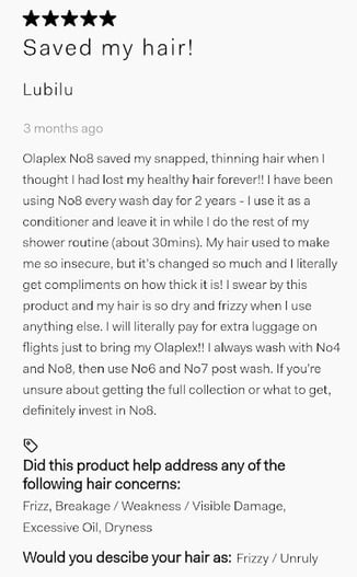 written review on OLAPLEX's website with star-ratings