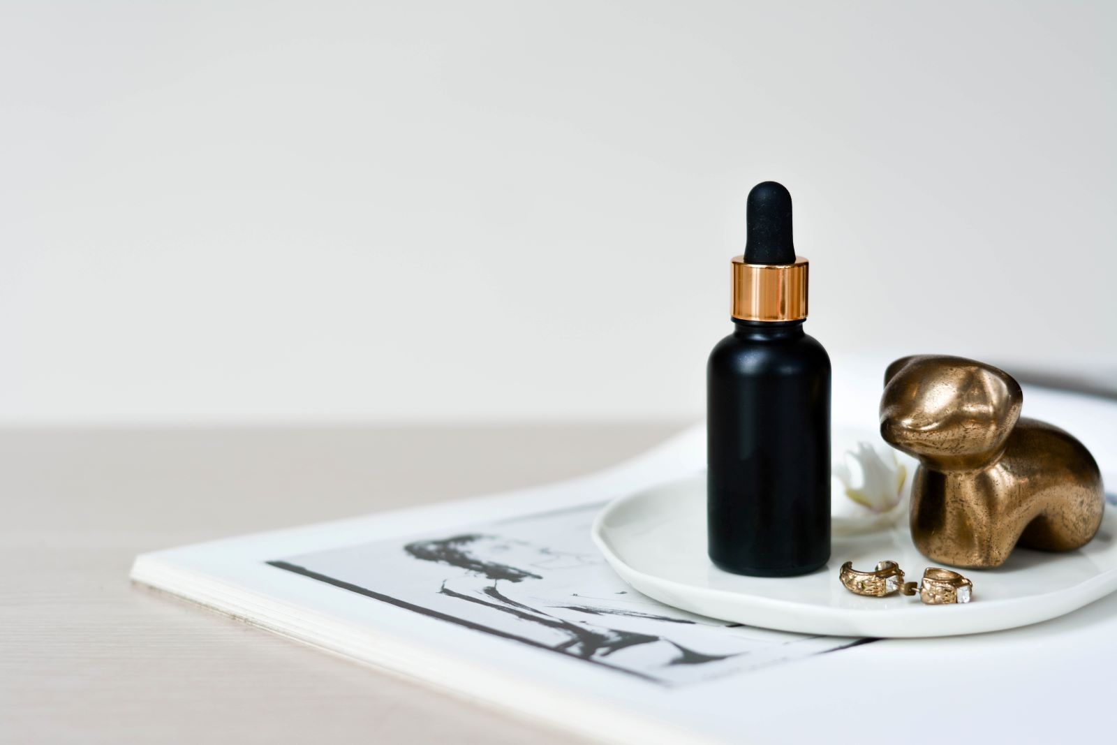 beauty and fashion products on a dresser