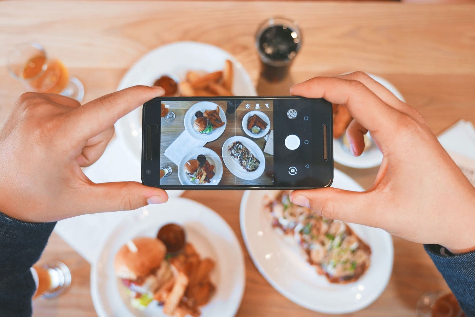user-generated content example of a person photographing their food