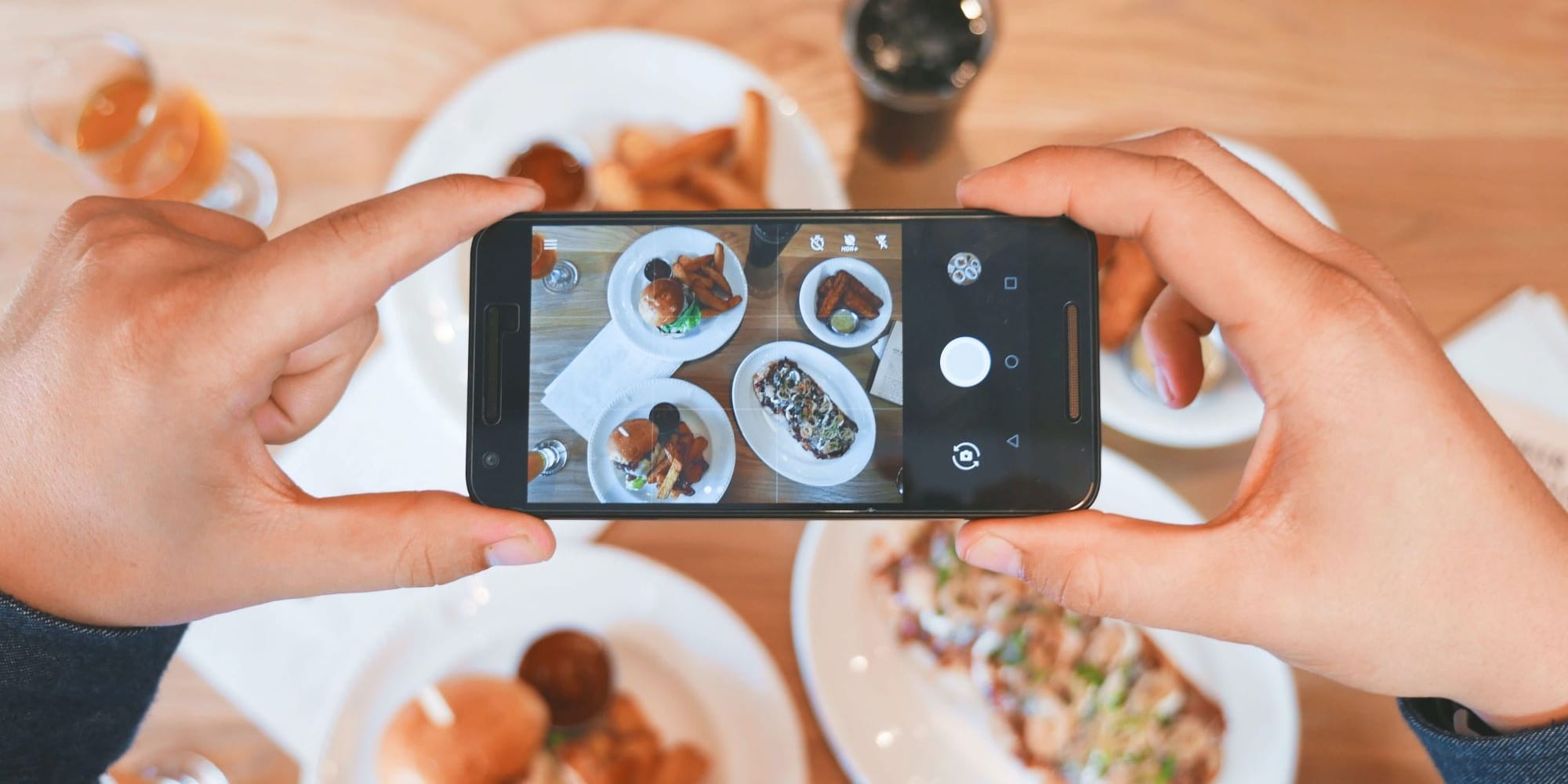 user-generated content example of a person photographing their food
